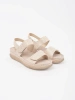 Beige women's sandals with velcro straps