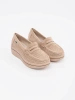 Beige thick-soled loafers