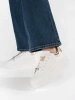 White platform sneakers with pins