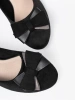 Black pumps with a bow on a pillar heel