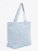 Blue and white checkered beach bag