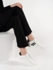 White perforated natural leather sneakers