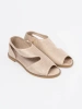 Golden cut-out sandals with flat sole