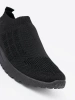 Black slip-on sports shoes with mesh upper