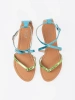 Flat sandals with green-blue straps