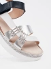 White and navy platform sandals with metallic decoration