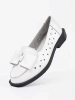 White perforated shoes with a bow