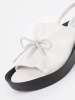 White wedge sandals with leather insole
