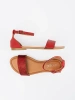Red flat sandals with covered heel